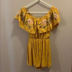 off the shoulder yellow romper with flowers
